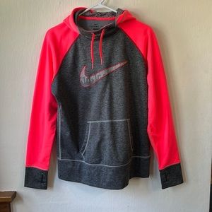 Women’s Nike Therma-Fit sweatshirt.